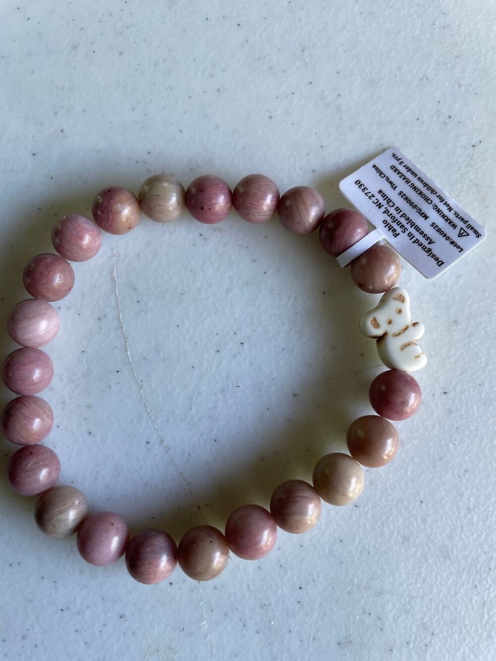 Fahlo Bracelet Rose stone with Koala charm…. no tracking card included